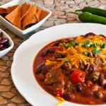 Hearty Chili Delight: Ground Beef Meets Enchilada Sauce