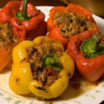 Hearty Stuffed Bell Peppers with Ground Beef and Rice Delight